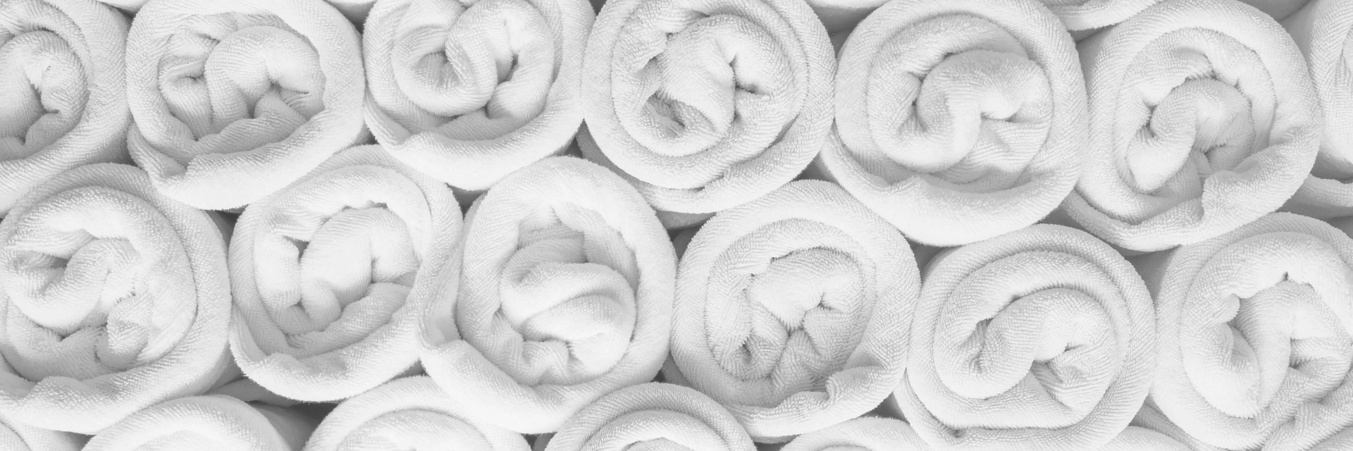 Rolled Up White Towels 1920X650